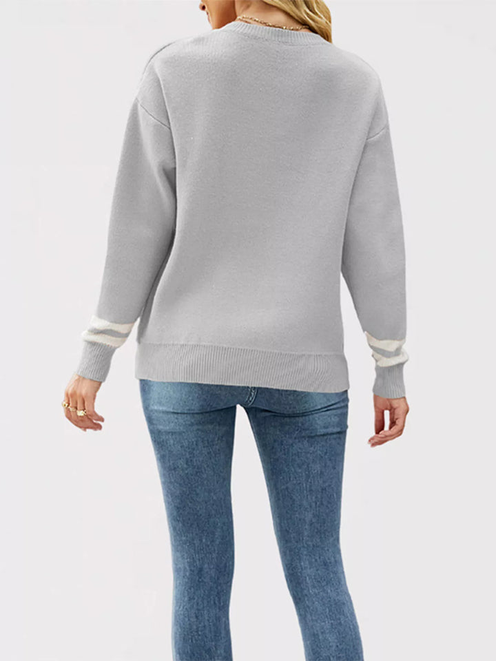 Back view of the gray oversized sweater with striped cuffs