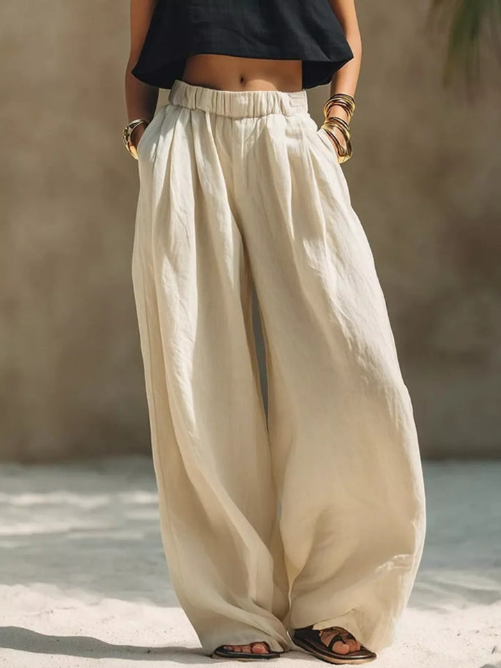 Women's palazzo pants in cream, extra wide leg pleated with an elastic waist