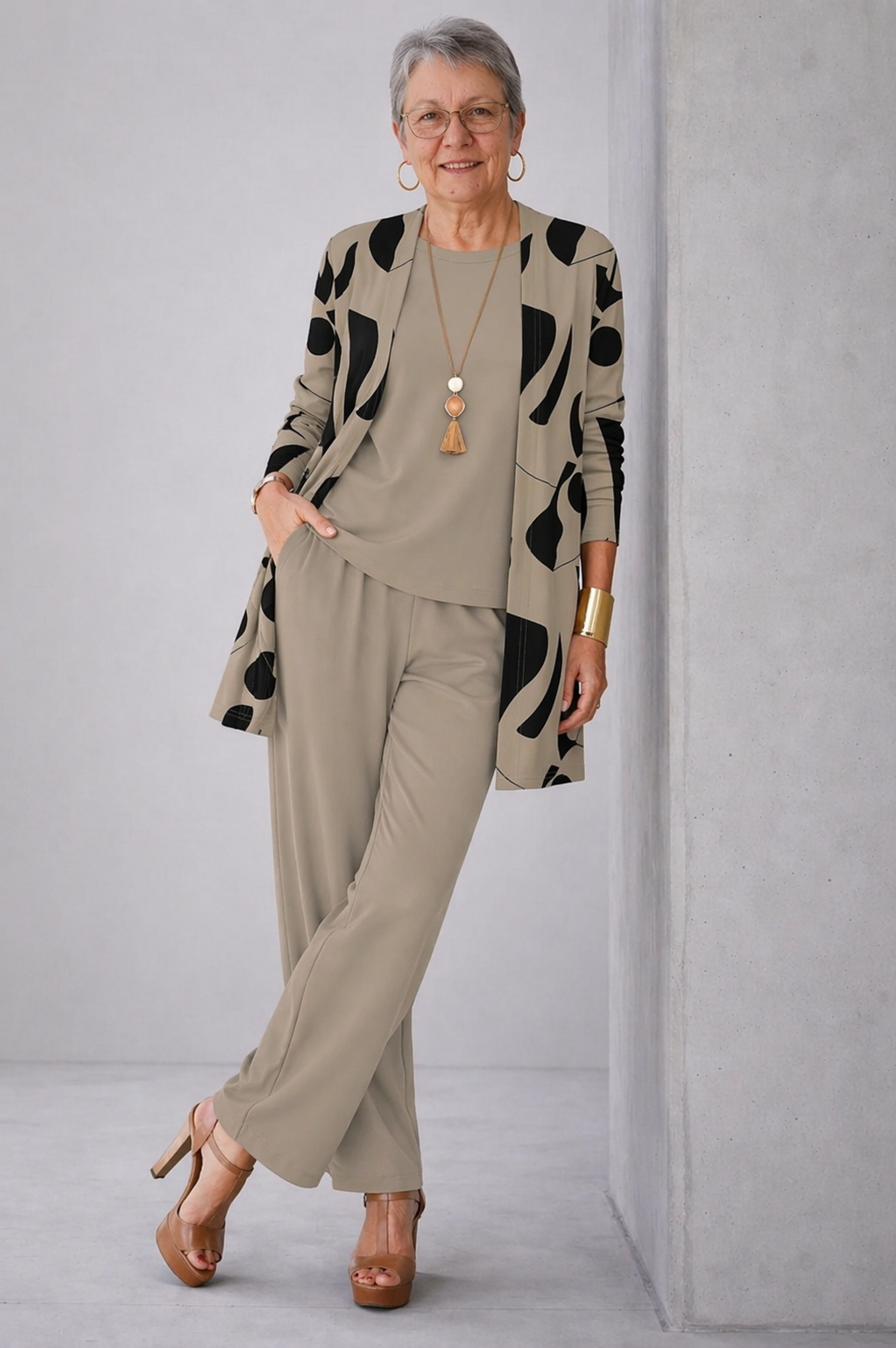 Women's pant suit in taupe, abstract shape print open front cardigan with solid top and pants