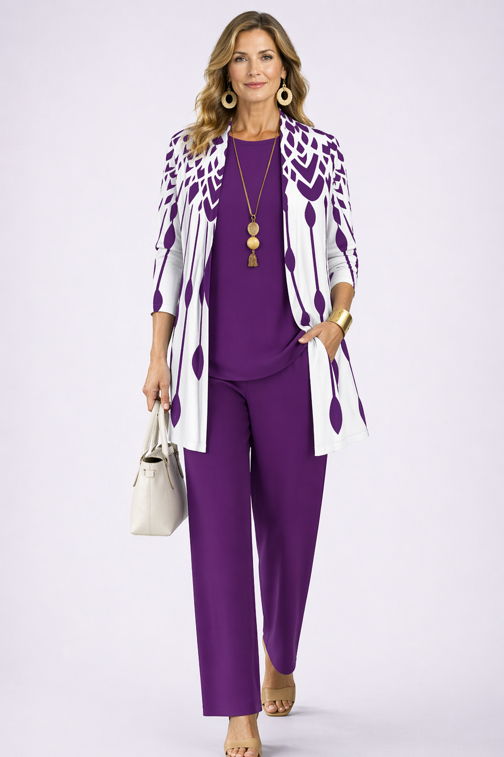 Women's pant suit in purple with a white teardrop print cardigan, round neck top and straight pants