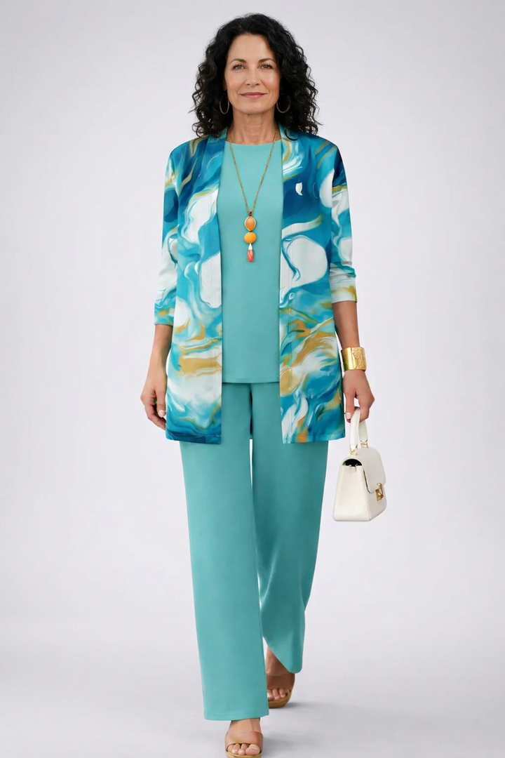 Women's pant suit in turquoise with a wave print open cardigan, round neck top and wide leg pants