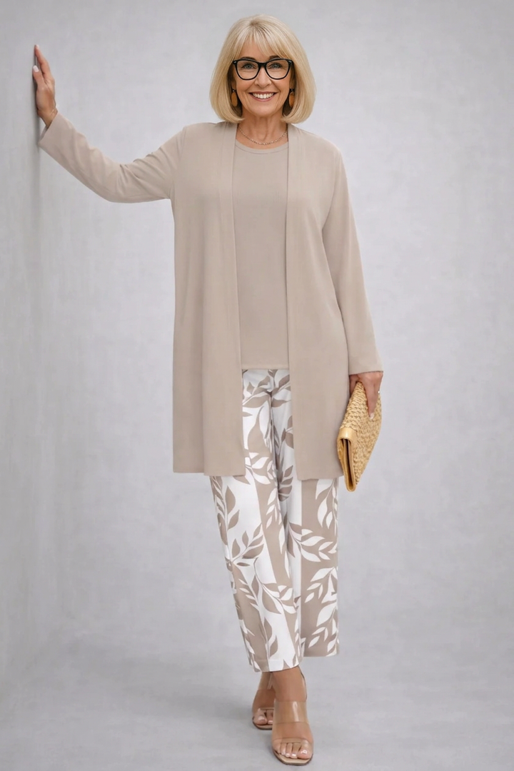 Women's pant suit in beige with a long open cardigan, round neck top and vine print ankle pants