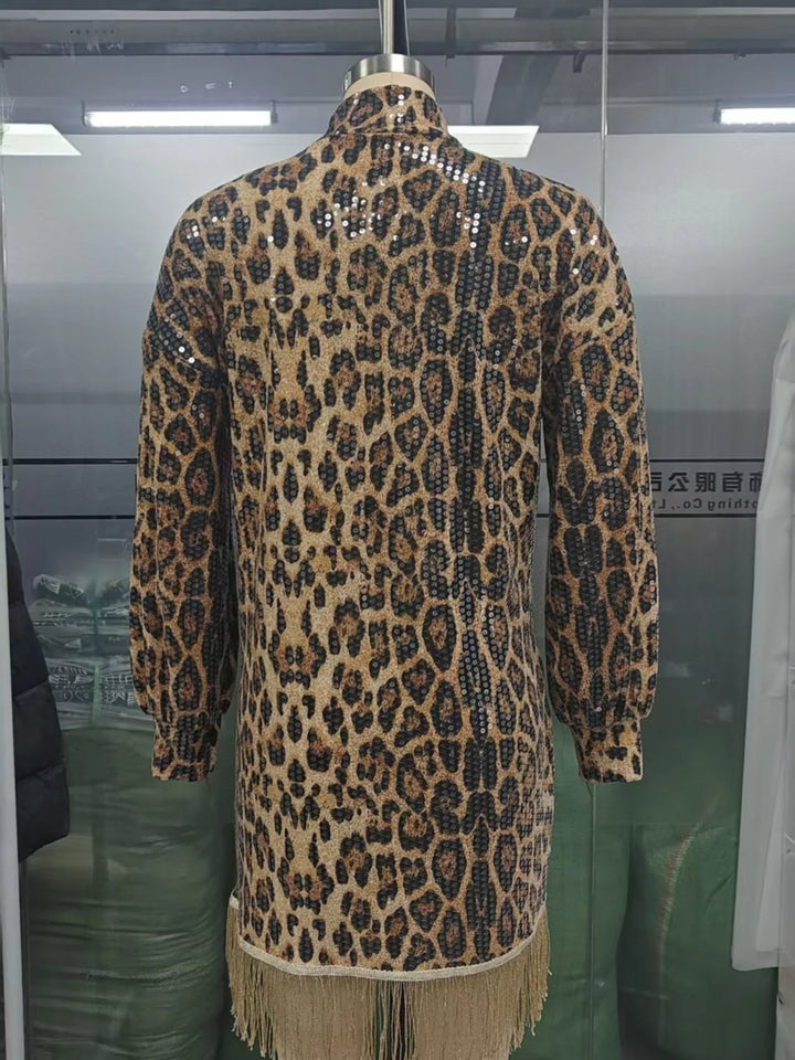 Leopard mini dress shown flat with mock neck