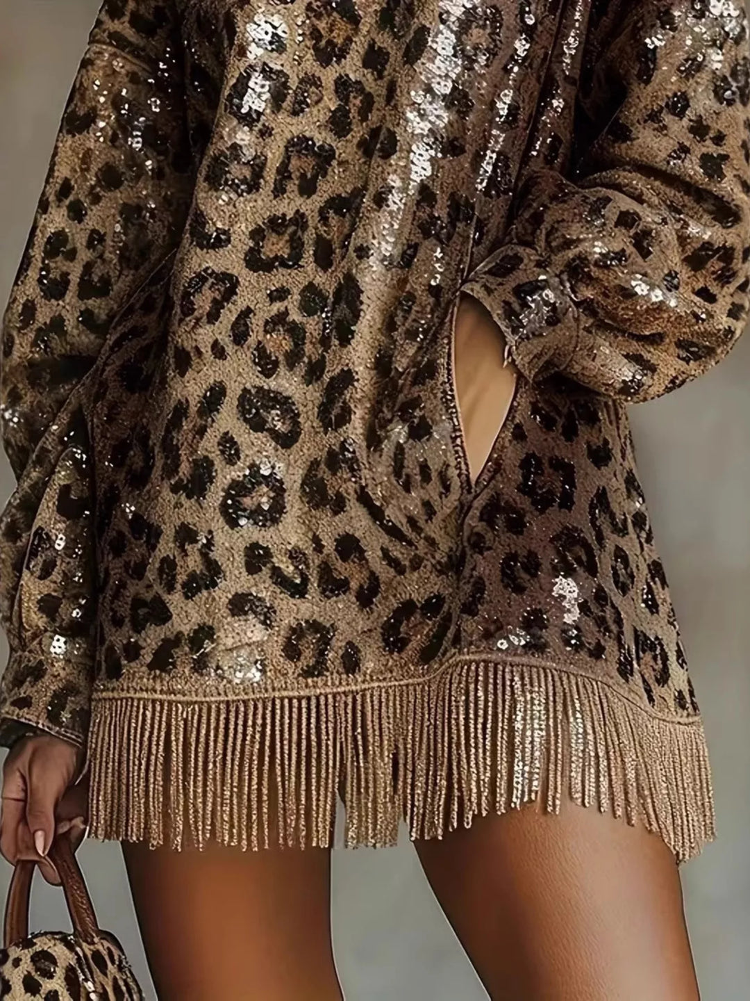 Leopard mini dress worn on a model, showing the mock neck