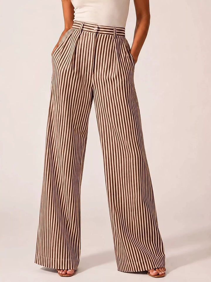 Brown pinstripe wide leg pants with pleats, standing front view