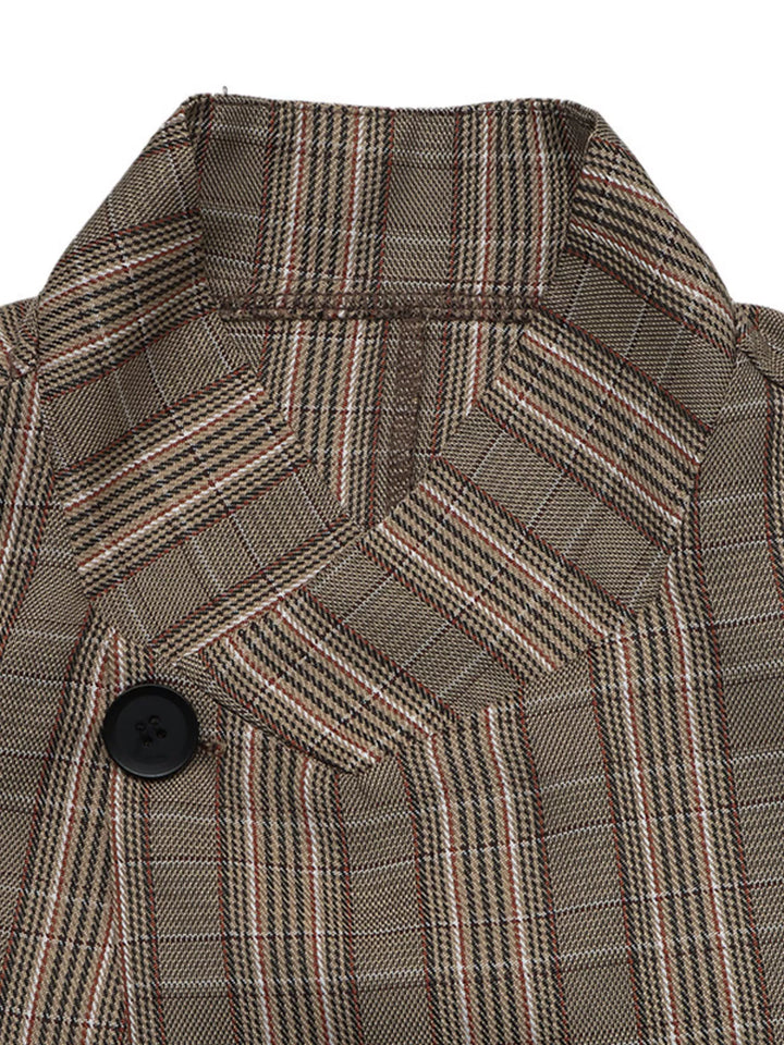 Close-up of the plaid blazer stand collar and single black button