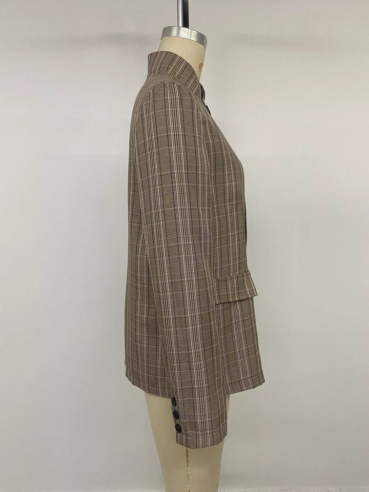 Side view of the mocha plaid stand collar blazer on a mannequin