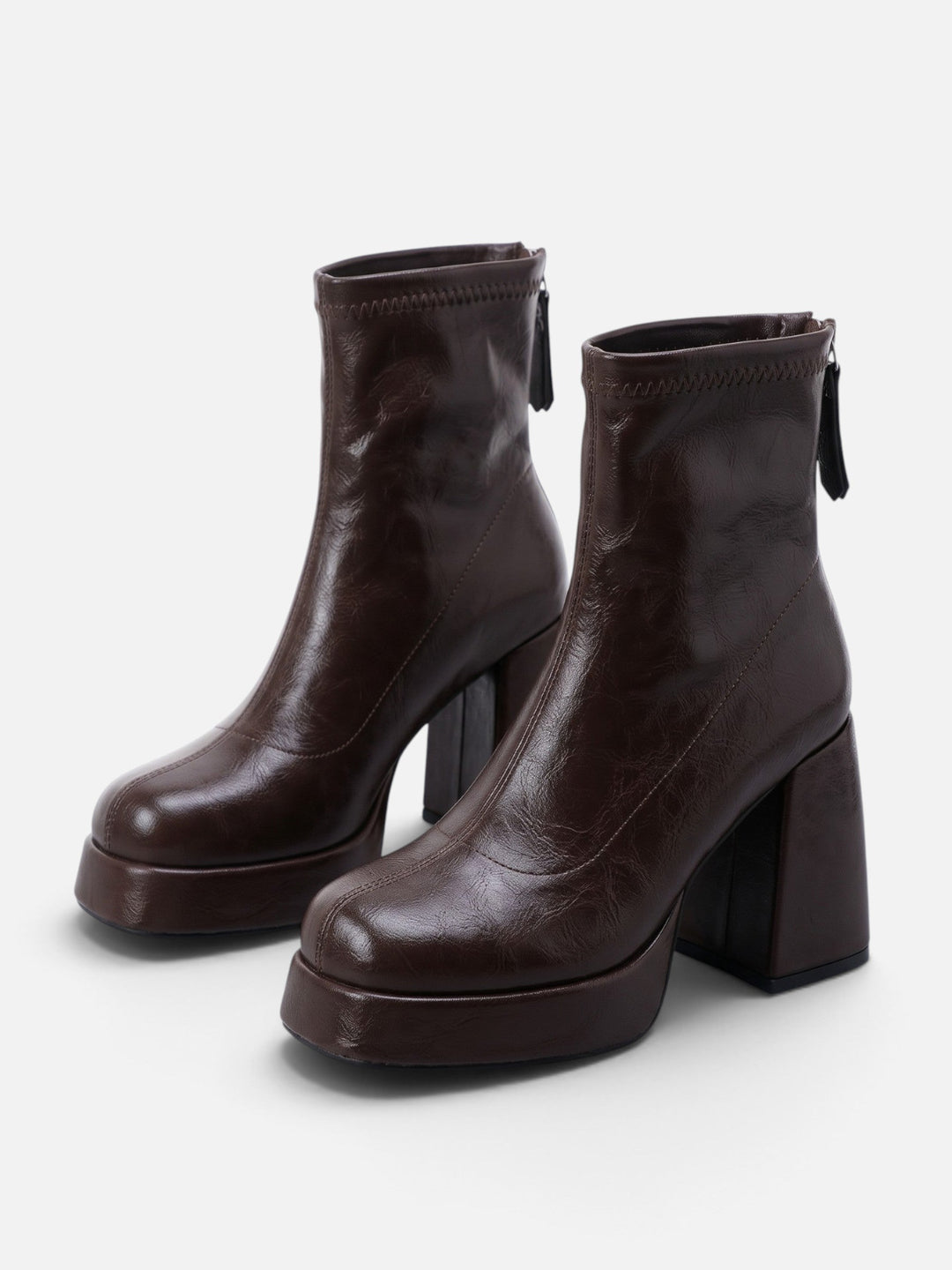 Women's platform ankle boots in dark brown with chunky block heel and back zip