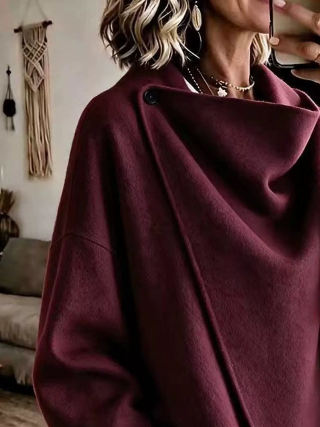 Asymmetric cowl neck draped plus size in burgundy, close-up detail