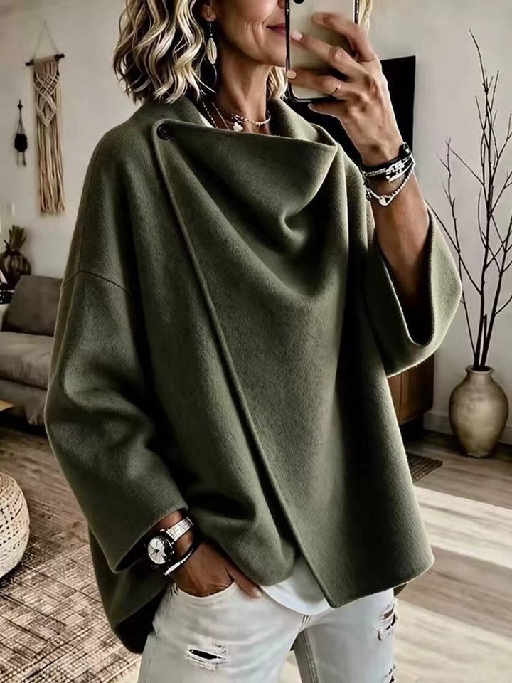 Asymmetric cowl neck draped plus size in green, front view