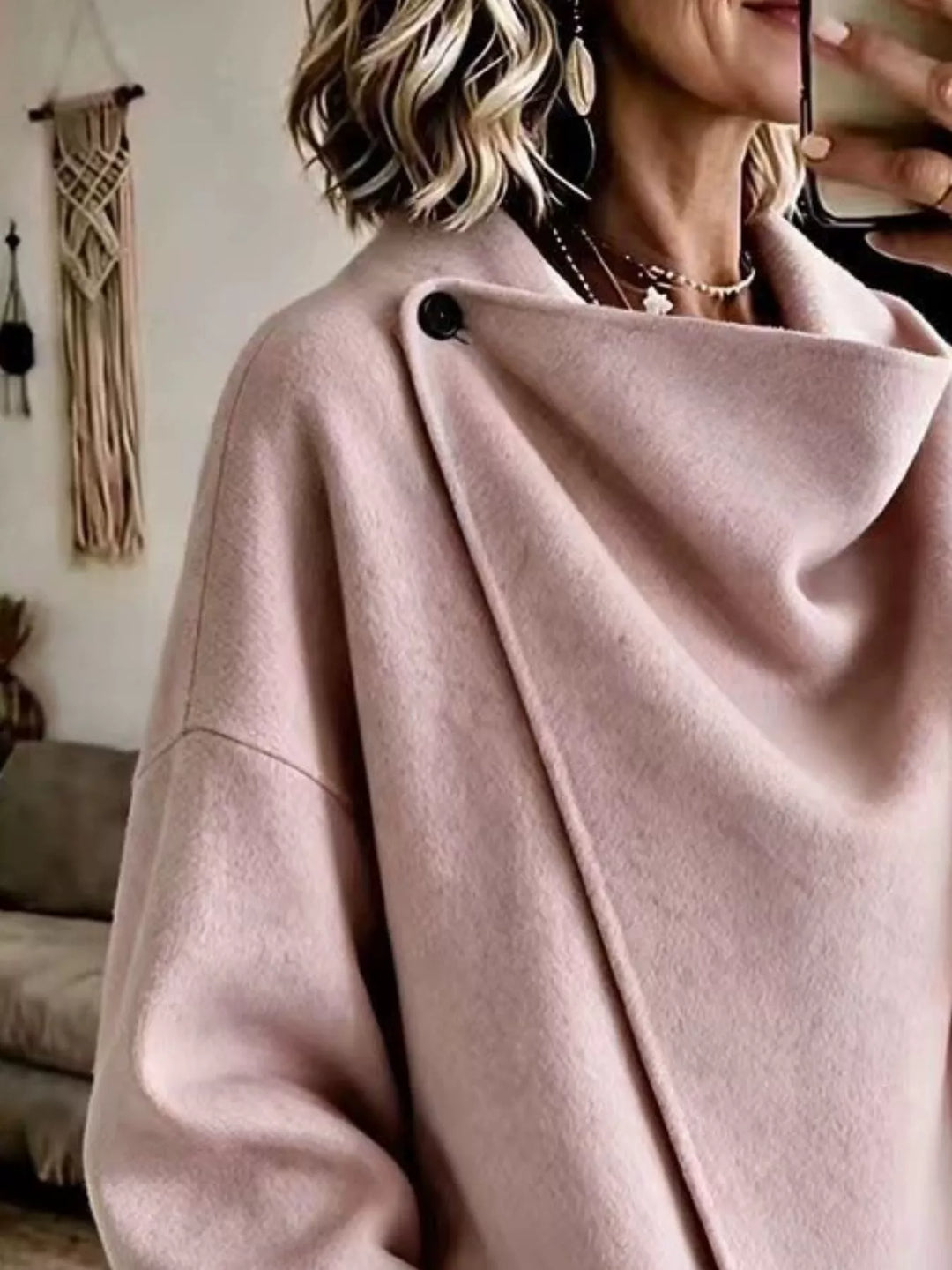 Asymmetric cowl neck draped plus size in pink, close-up detail
