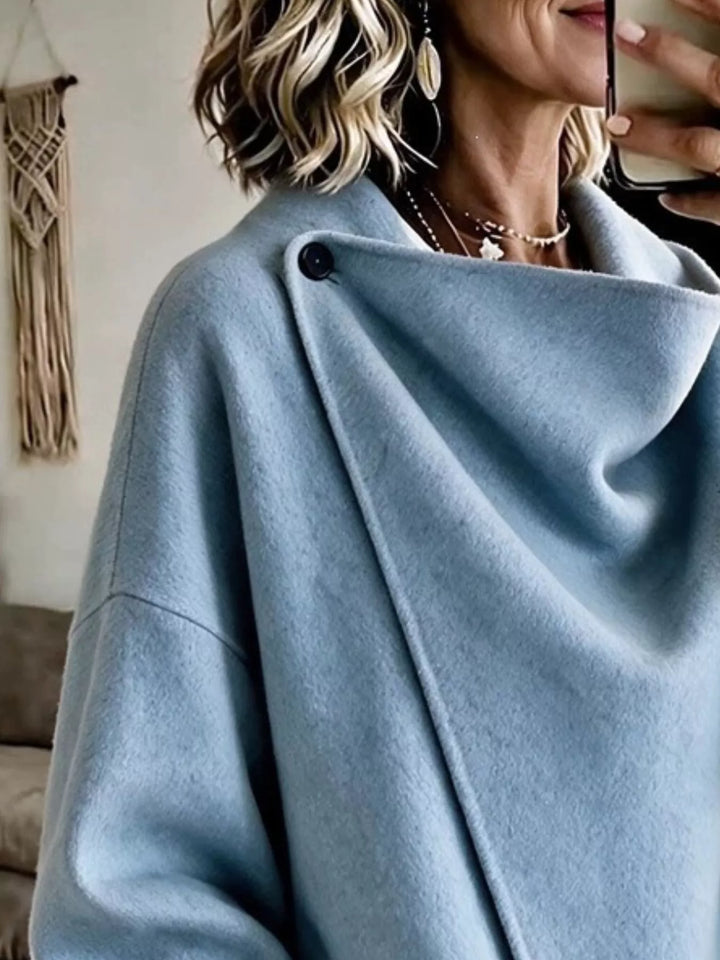 Asymmetric cowl neck draped plus size in sky blue, close-up detail