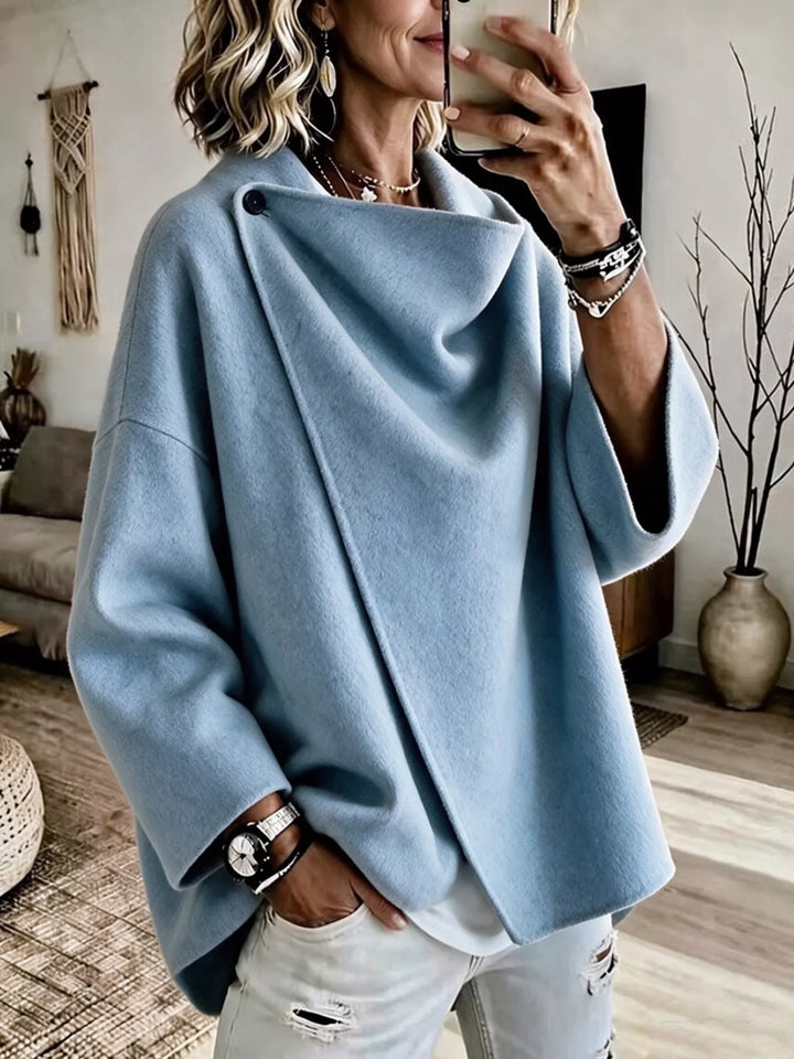 Asymmetric cowl neck draped plus size in sky blue, front view