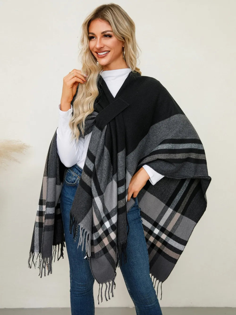 Plaid fringe hem open front in black, front view