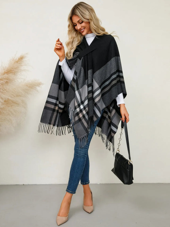 Plaid fringe hem open front in black, styled on model