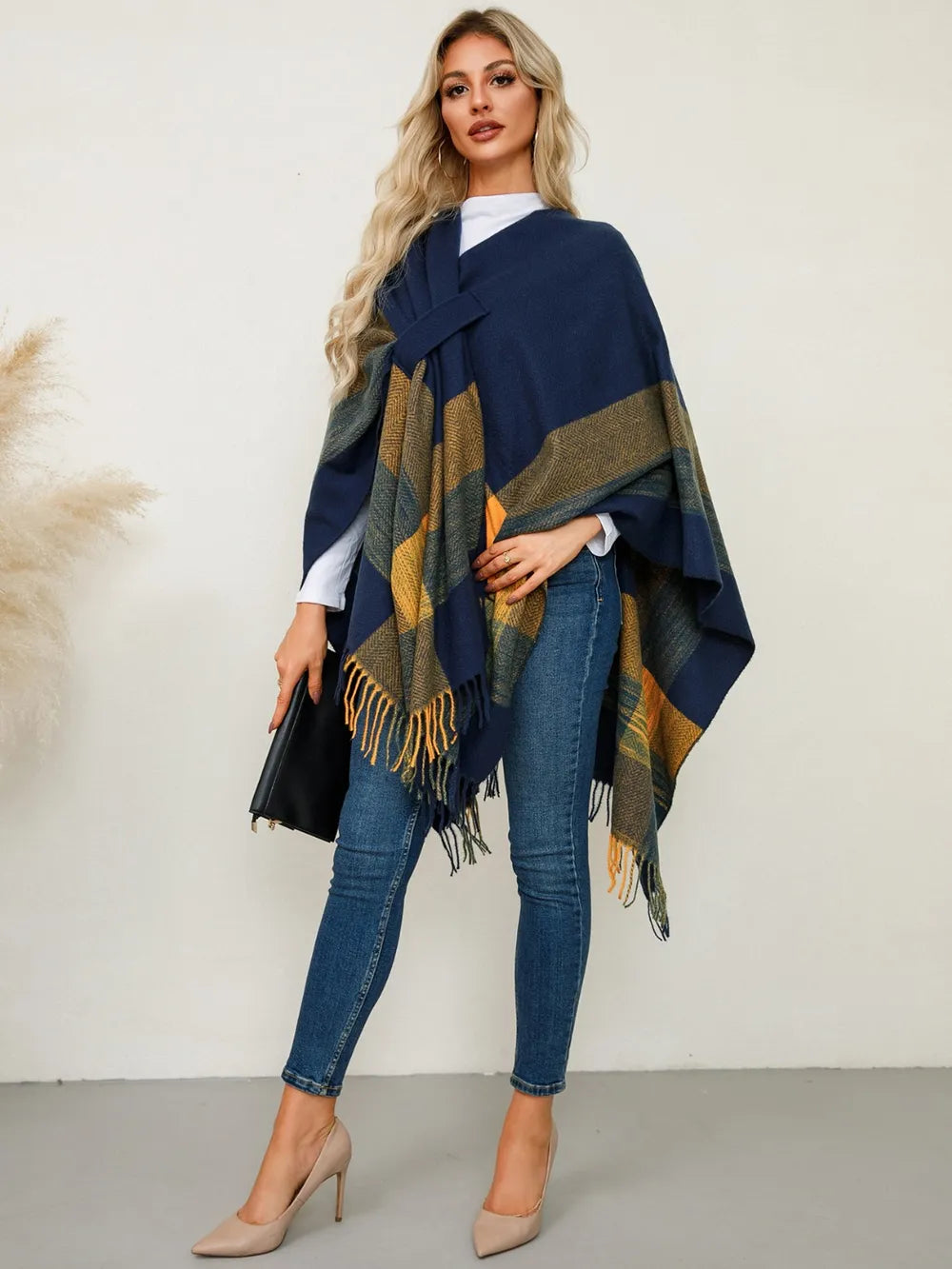 Plaid fringe hem open front in navy, styled on model 2