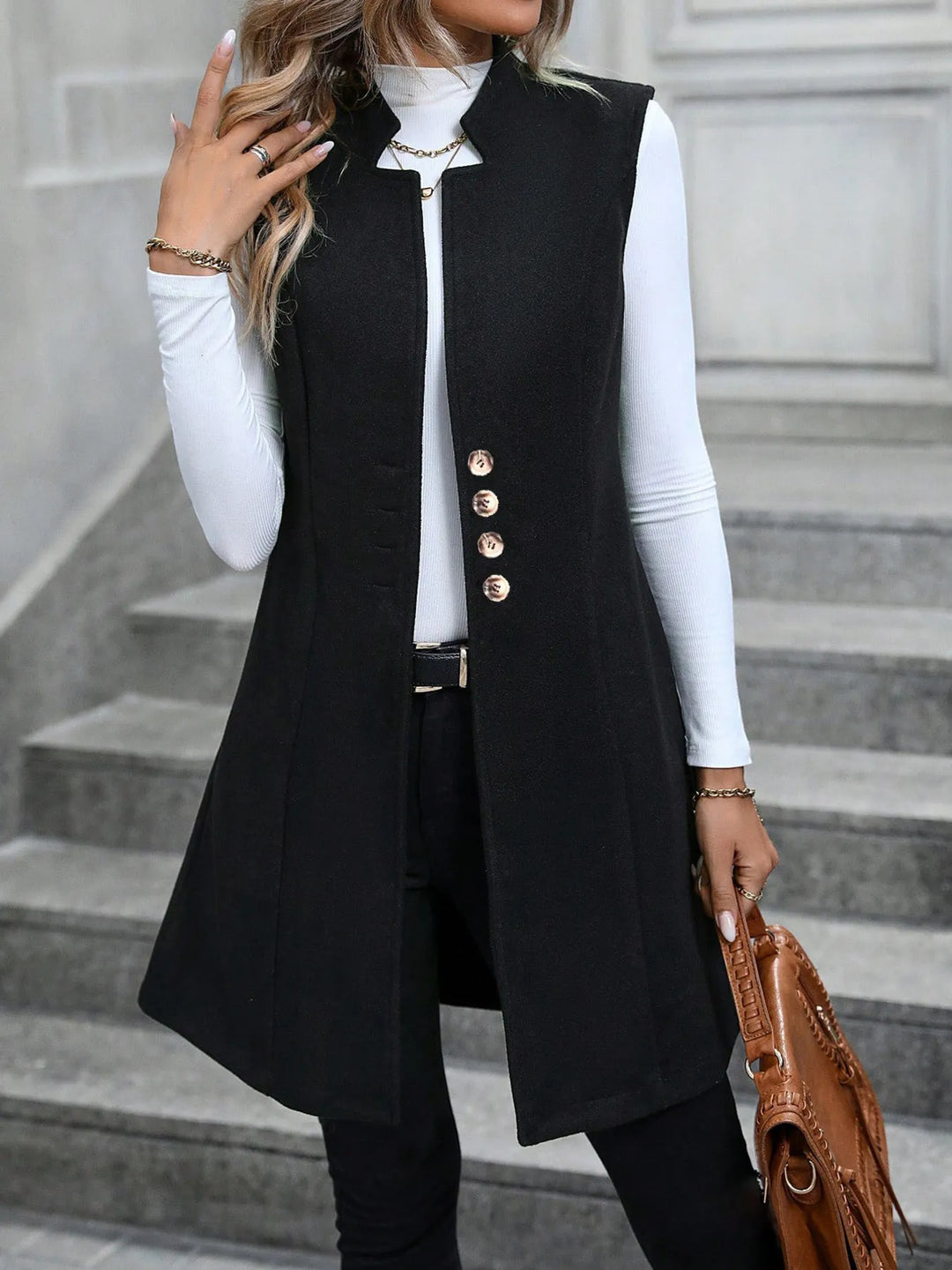 Longline stand collar button side pockets in black, styled on model 2