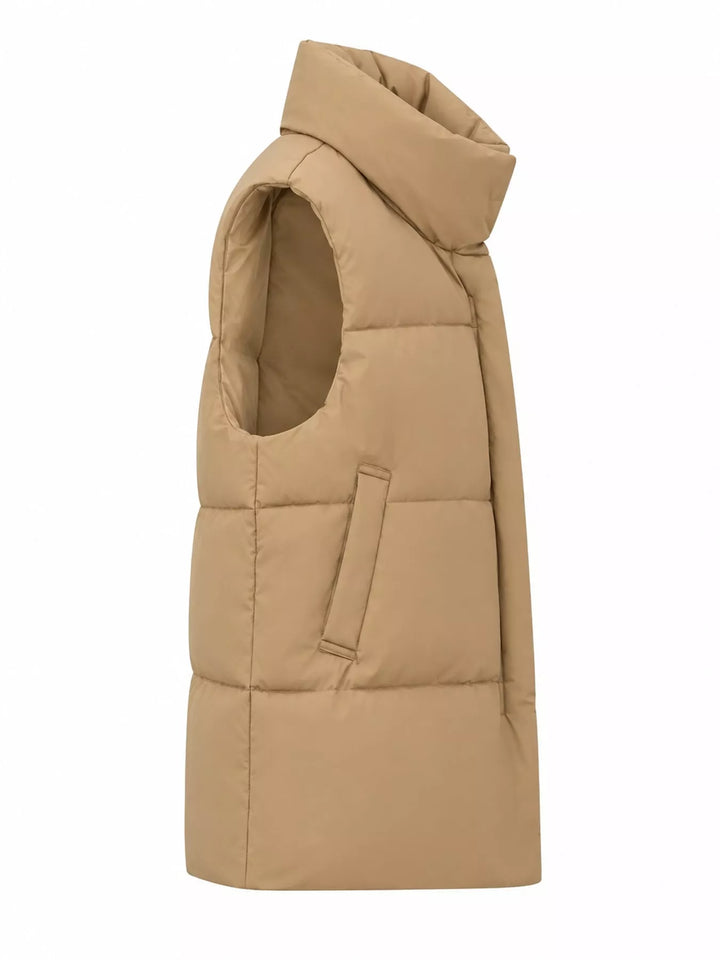 Quilted stand collar zip front in khaki, styled on model