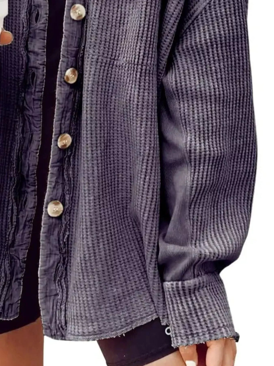Charcoal shacket close-up showing the ribbed sleeve and button front