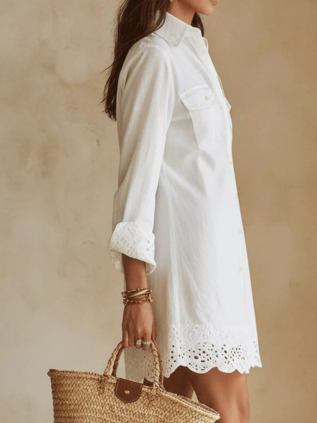 White shirt dress worn on a model, showing the button down front