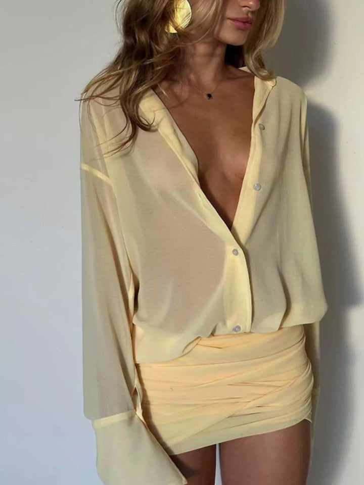 Pastel yellow shirt dress worn on a model, showing the sheer fabric