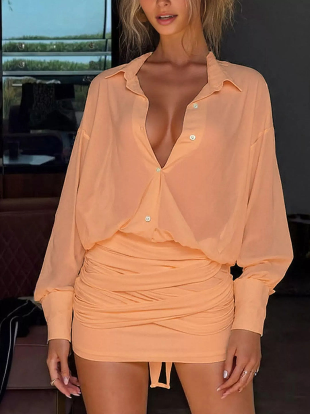 Sherbet shirt dress worn on a model, showing the sheer fabric