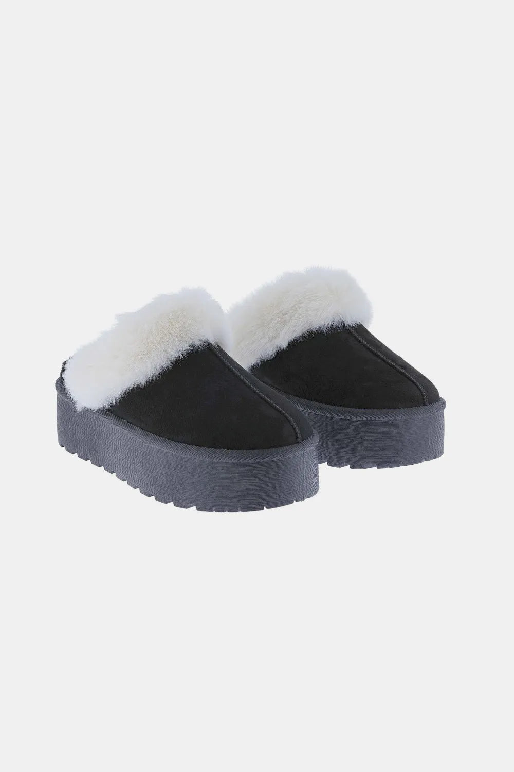 Pair of black platform clog slippers with plush white trim, angled view
