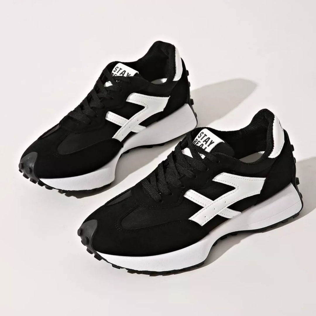 Women's sneakers in black, chunky platform lace up with mesh panels and white accent