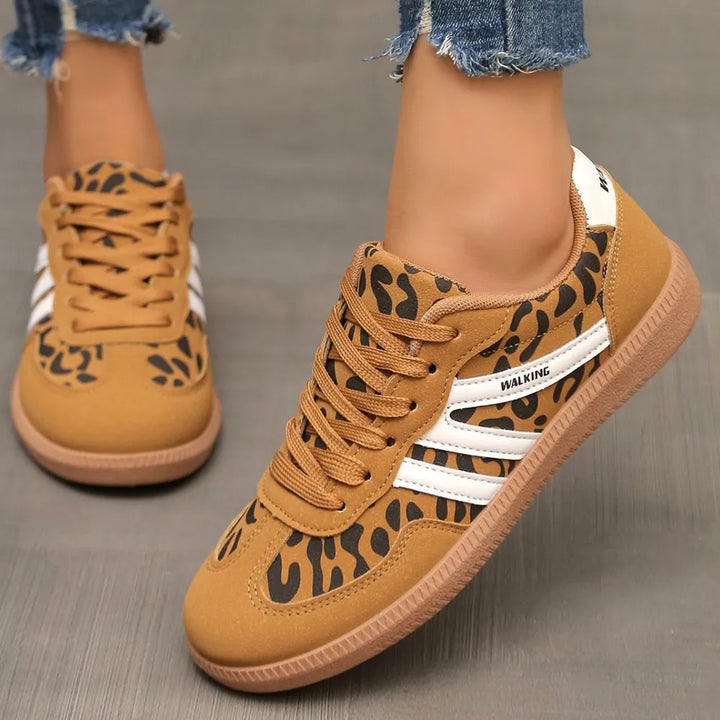 Leopard print retro low top sneakers with white stripes and a gum sole