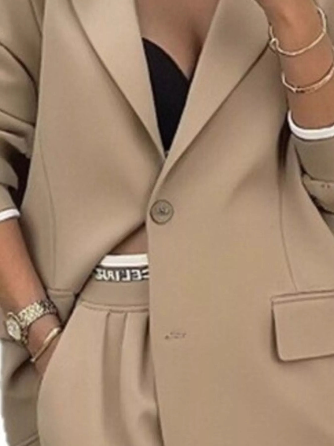 Oversized one button blazer and wide leg pants in khaki, close-up detail