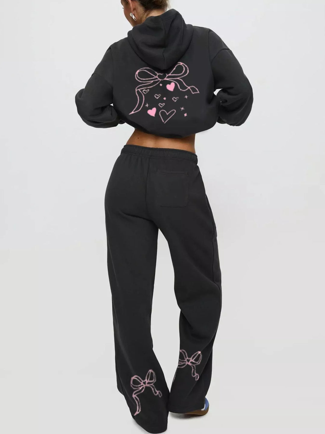 Bow print hoodie and wide leg sweatpants in black, back view