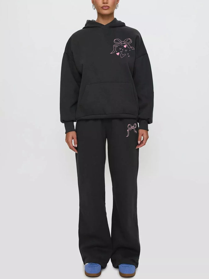 Women's sweat set in black, bow print hoodie and wide leg sweatpants