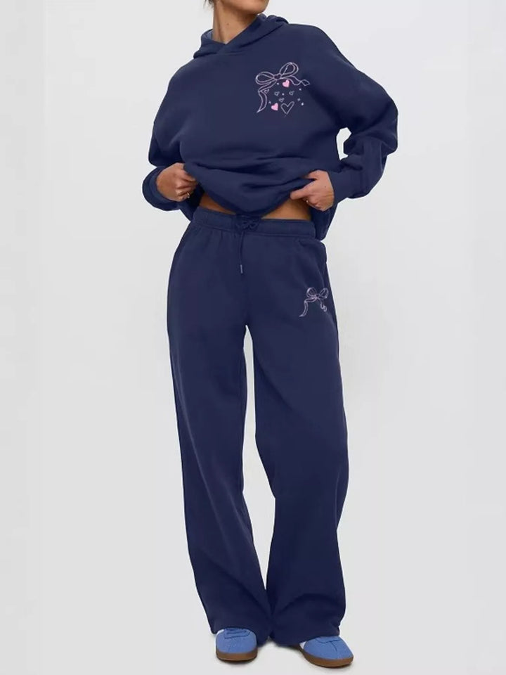 Bow print hoodie and wide leg sweatpants in blue, front view