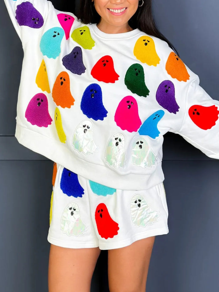 Ghost print sweatshirt and shorts in white, styled on model