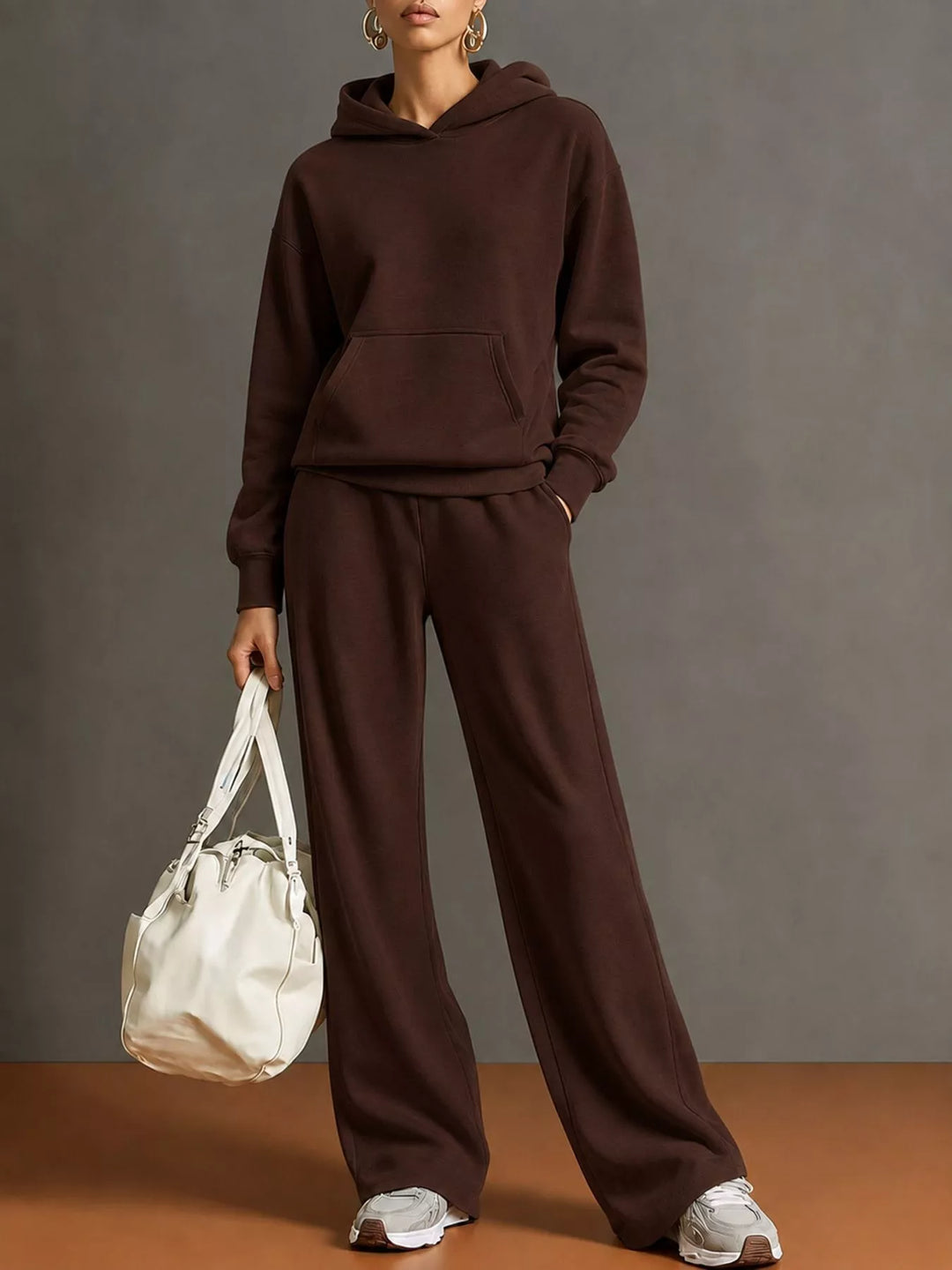 Kangaroo pocket hoodie and wide leg pants in dark brown, front view
