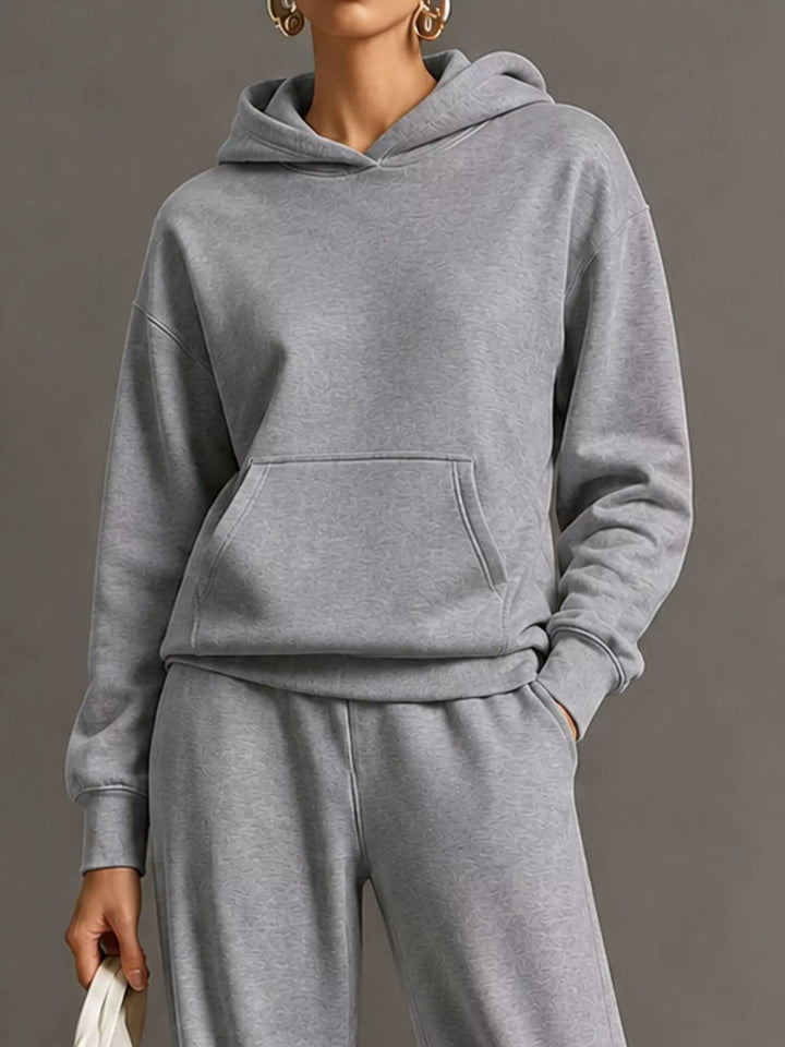 Kangaroo pocket hoodie and wide leg pants in gray, close-up detail