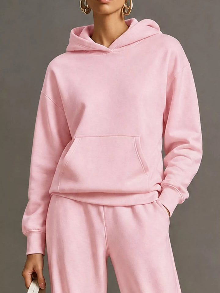 Kangaroo pocket hoodie and wide leg pants in pink, close-up detail