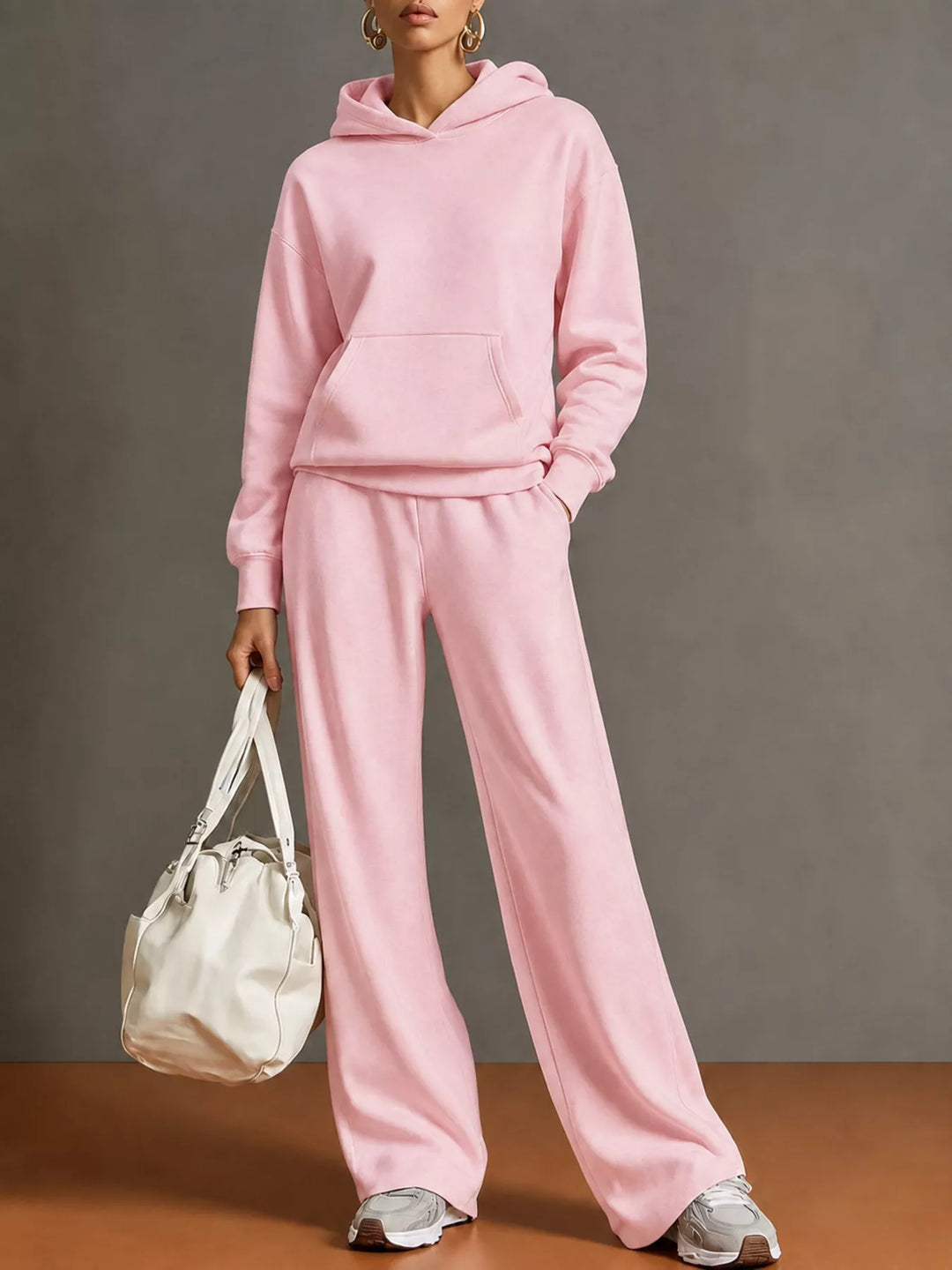 Women's sweat set in pink, kangaroo pocket hoodie and wide leg pants