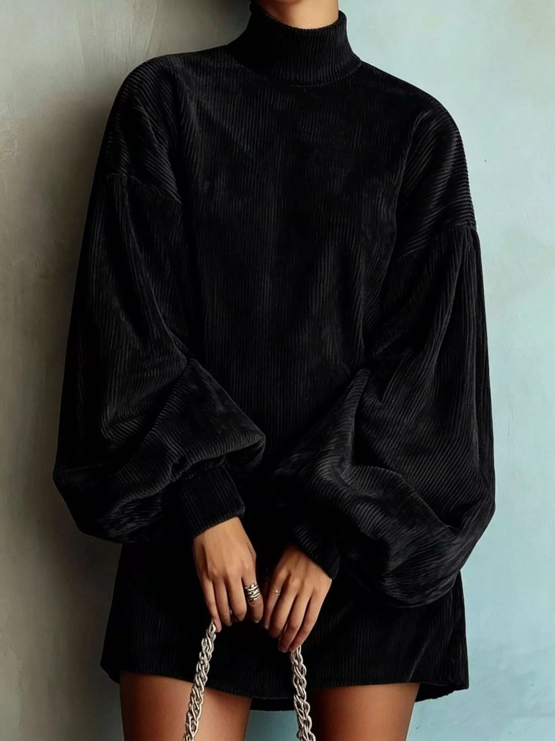 Black sweater dress front view with ribbed knit look