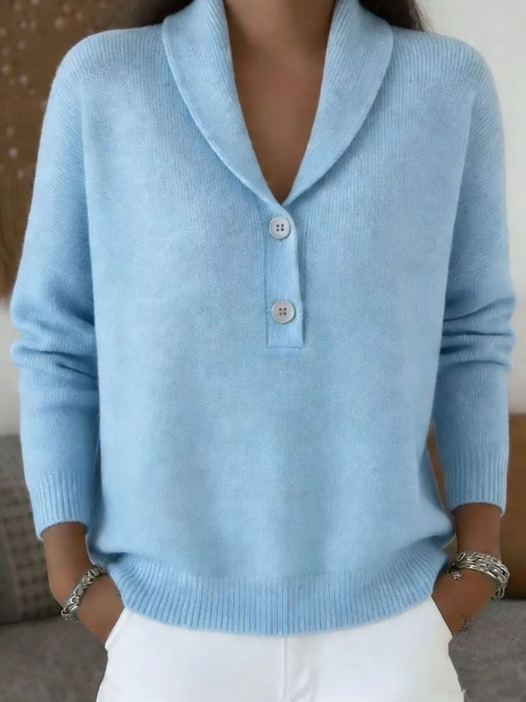 Light blue shawl collar sweater with button placket, front view