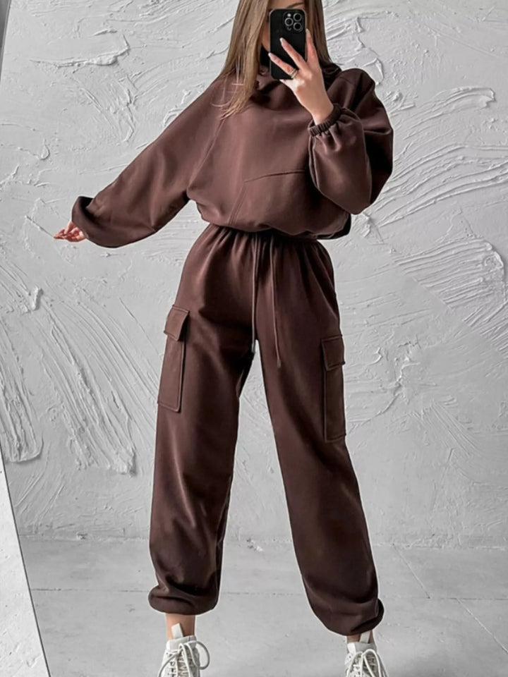 Brown sweatsuit with cropped hoodie and cargo joggers, full outfit view
