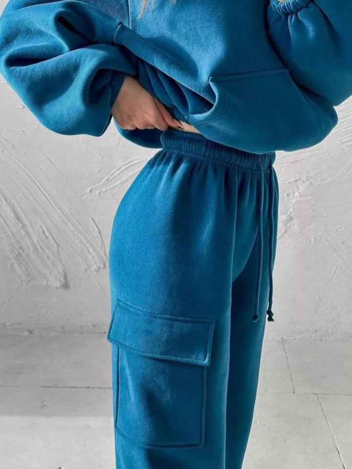 Teal blue cargo jogger side pocket and elastic waist detail