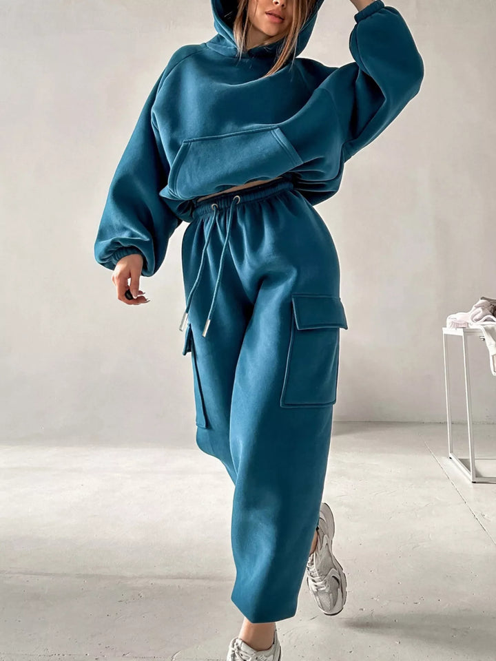 Women's sweatsuit in teal blue, hoodie and cargo joggers set, front view