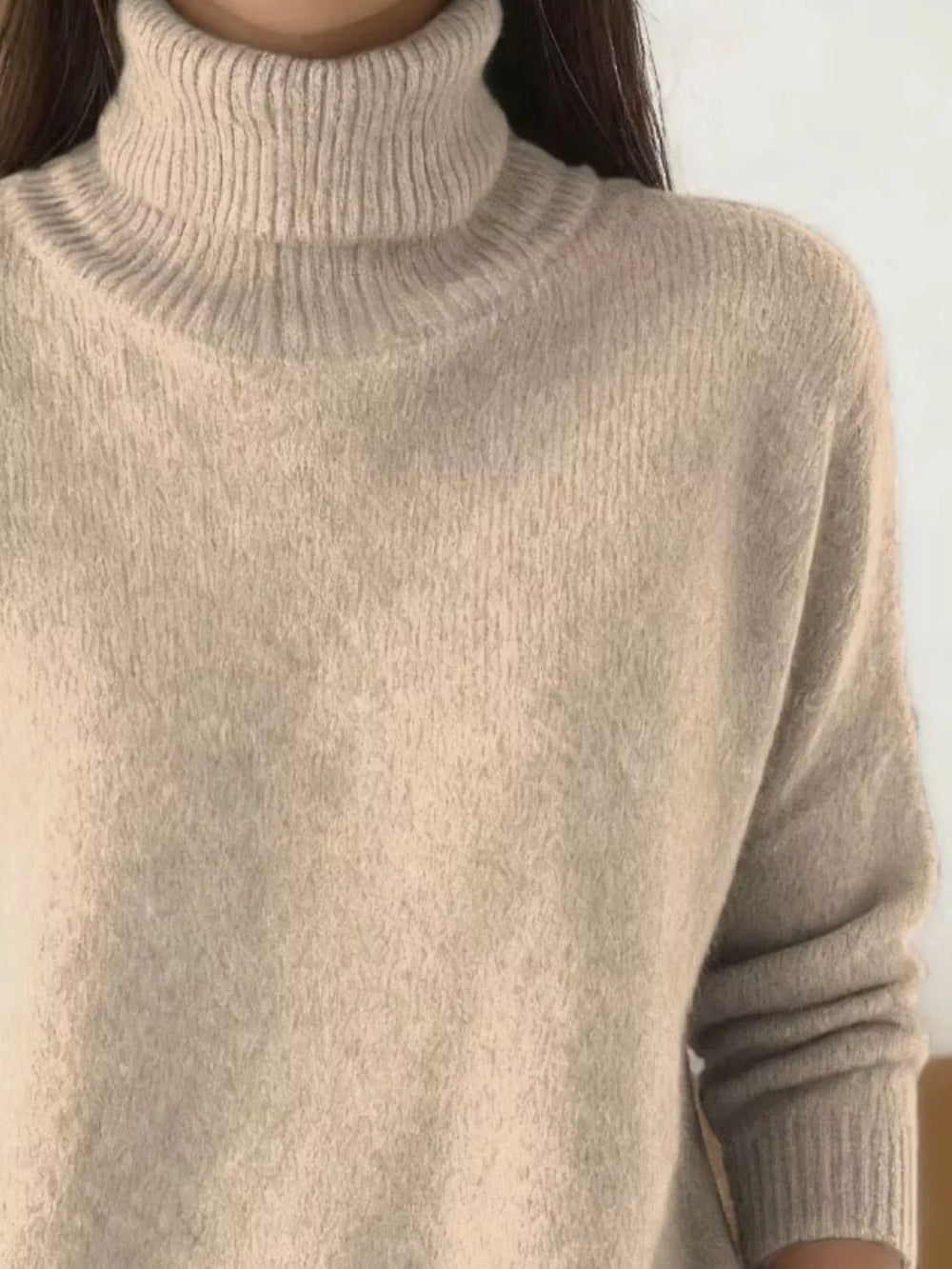 Soft fuzzy look long sleeve ribbed in apricot, close-up detail