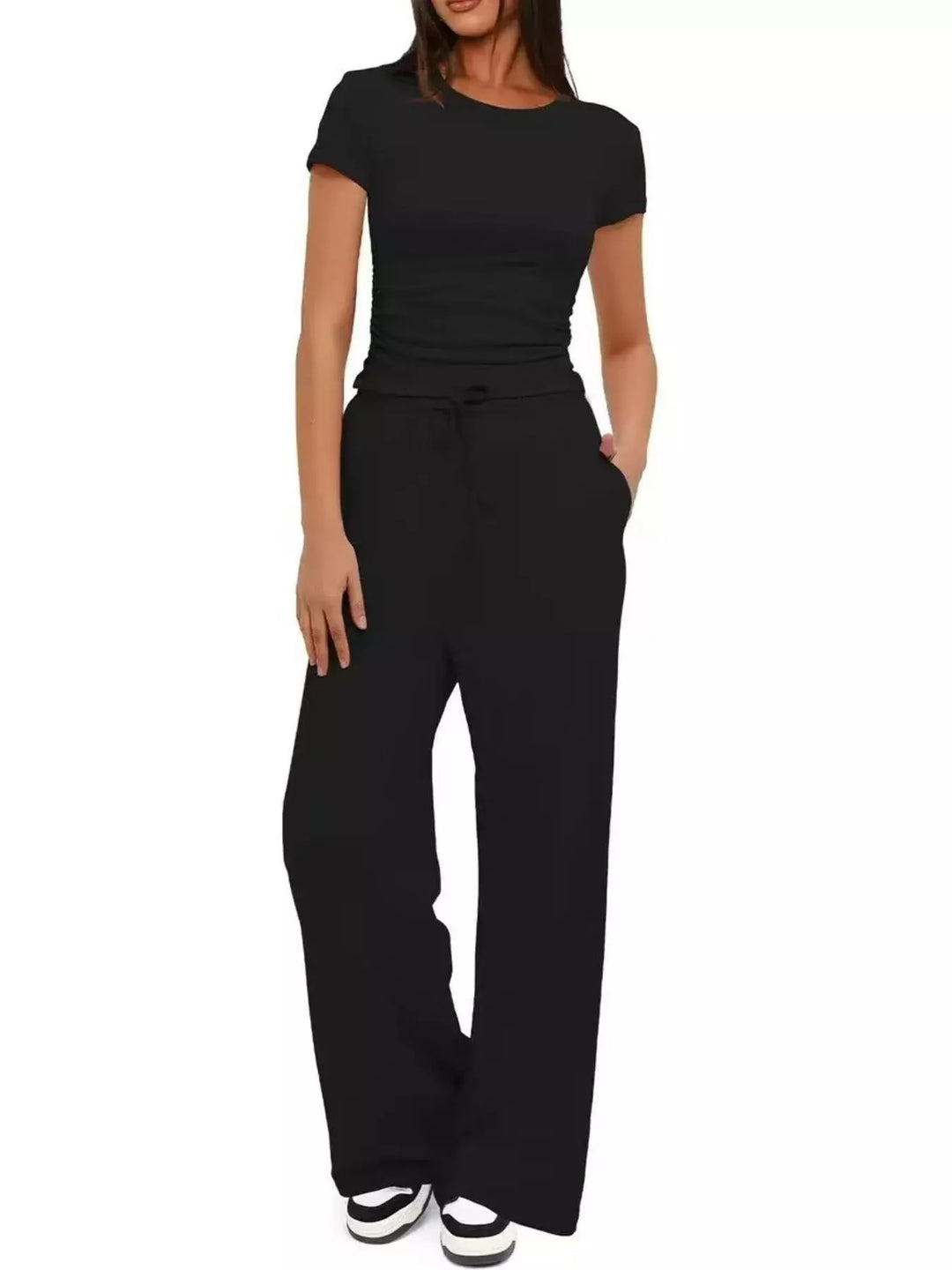 Black two piece set front view with drawstring waist and pockets