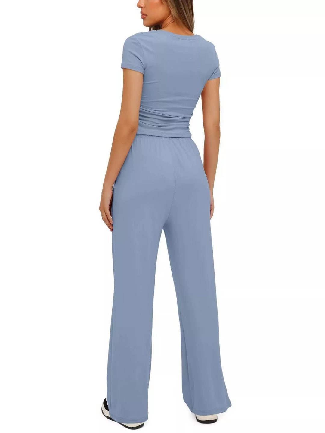 Back view of the light blue ruched top and wide leg pants set