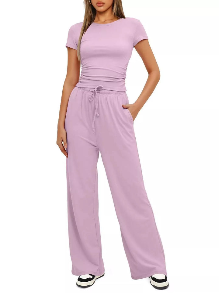 Lilac two piece set with ruched short sleeve top and wide leg pants