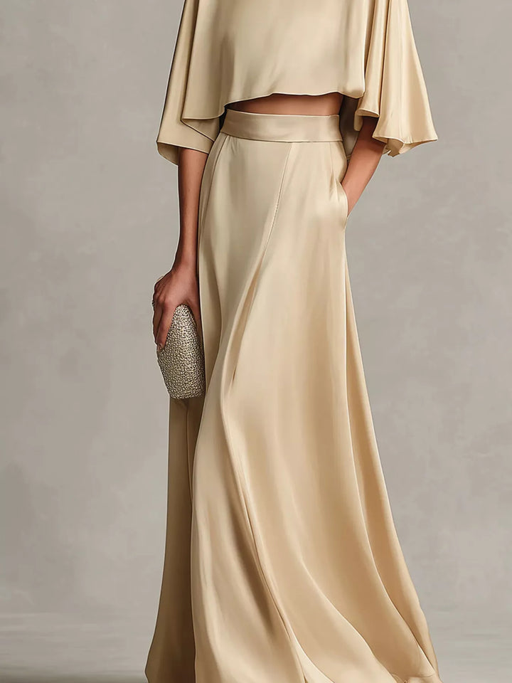 Lower body view of the champagne maxi skirt with the cropped top hem