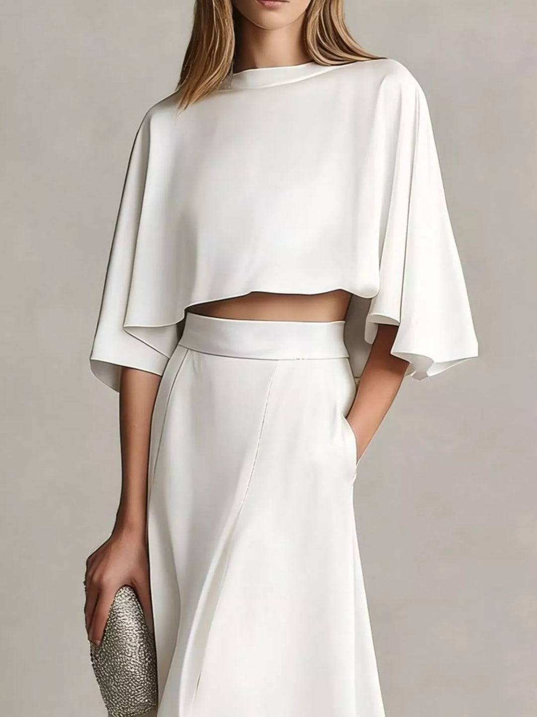White two piece skirt set with a flutter sleeve crop top, front view