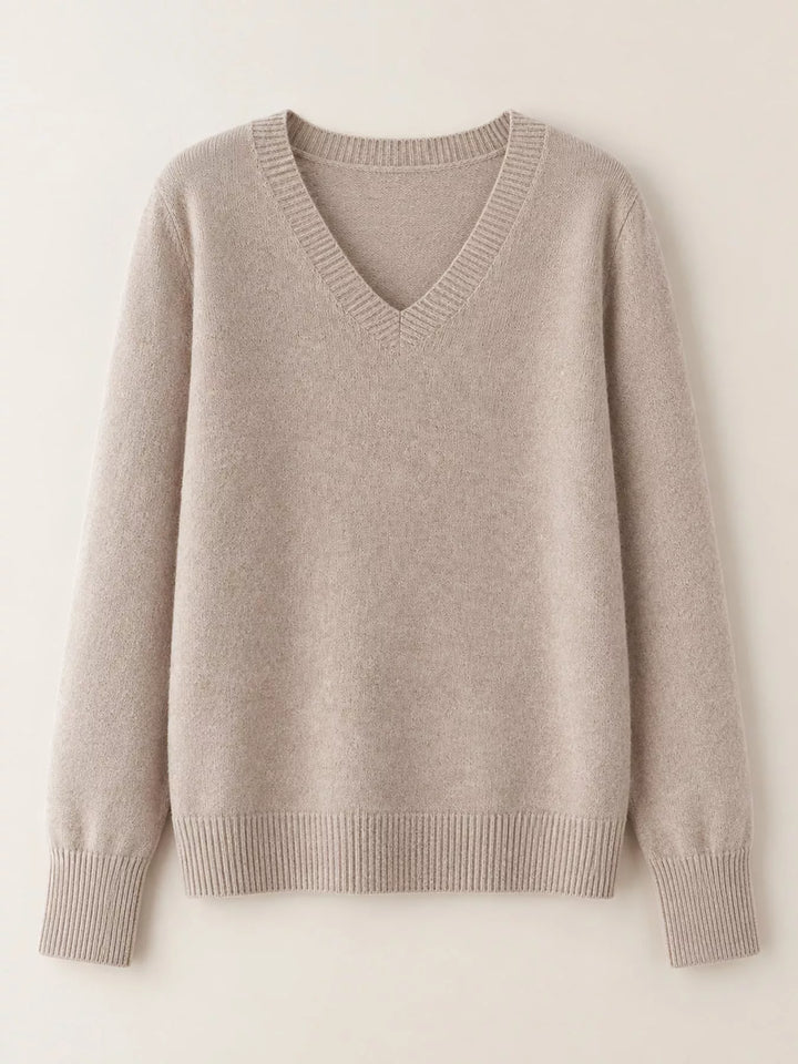 Flat front view of the light camel fine knit long sleeve V neck sweater
